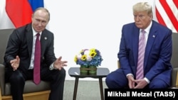 Владимир Путин и Дональд Трамп в Осаке, 28 июня 2019 год