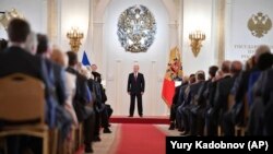 Президент России Владимир Путин на приеме в честь Дня России в Большом Кремлевском дворце, 12 июня 2018 года